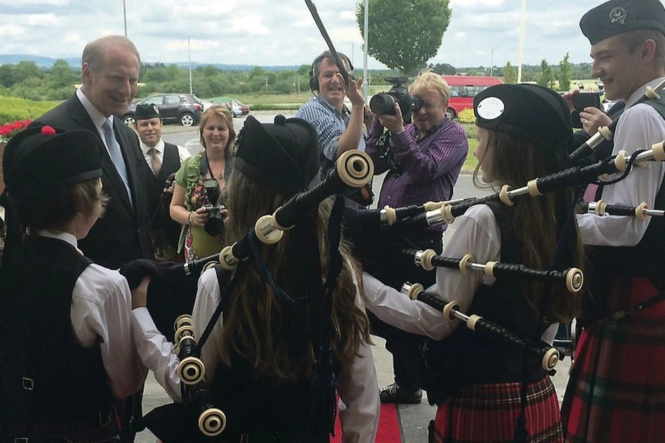 Dr. Richard Haass meets some young pipers at the Tipperary Peace Award
