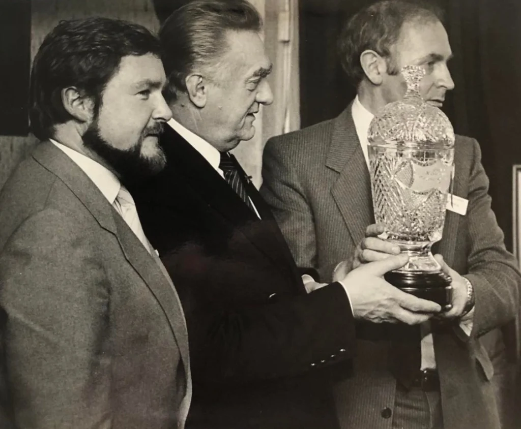 Soviet Ambassador to Ireland, Gennady Uranov, accepting the 1988 Tipperary Peace Award on behalf of Mikhail Gorbachev, from Joe Quinn, Chair of Tipperary Peace Convention. Also pictured is Ken Barry, representing the sponsors.
