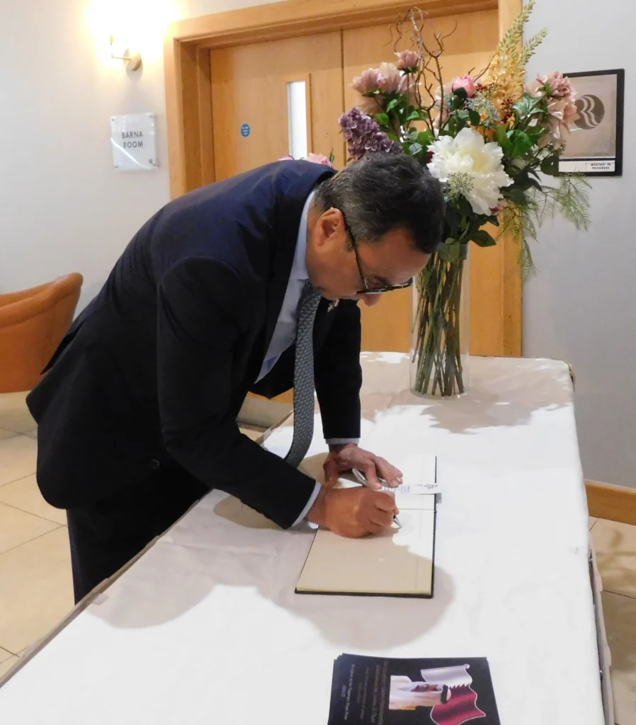 Ambassador of Kuwait, signs the Visitors Book at the Tipperary Peace Award Ceremony