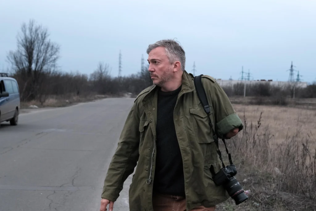 Giles Duley pictured out in the field